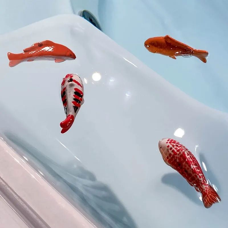 Buy Fisk i porcelæn, orange/hvid, 28cm