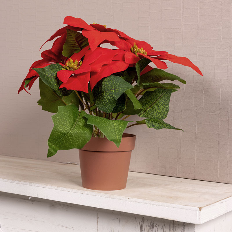 Kunstig rød julestjerne med grønne blade - 27 cm høj i brun potte