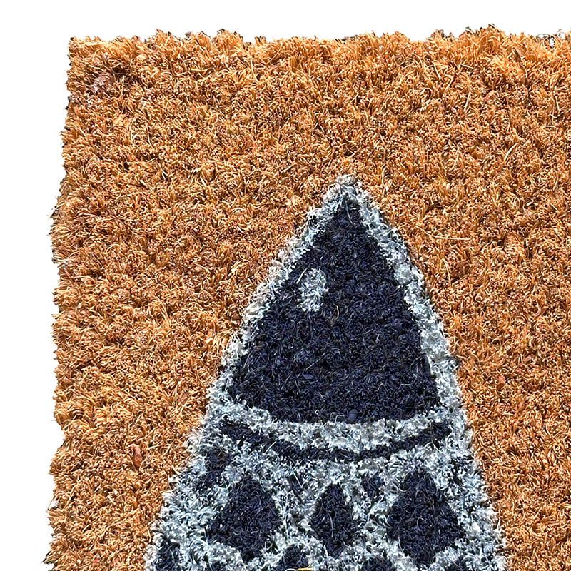 Dørmåtte af kokos med fiskemotiv closeup