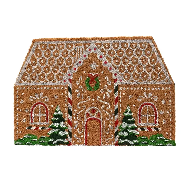 Dørmåtte formet som et julekagehus med i brun med hvidt tag