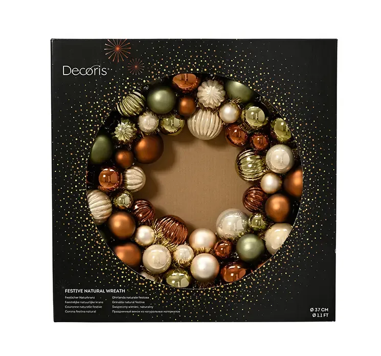 Julekugle krans af plast med julekugler i farverne brun, grøn og champagne vist i æske