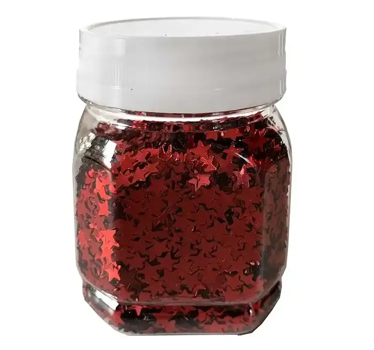 Konfetti små stjernedrys af plast i rød