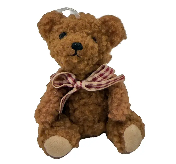 Bamse også kaldet teddybear med sløjfe af plys i mørke brun julepynt med ophæng