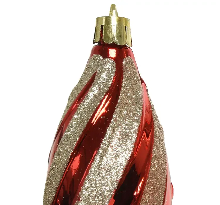 Juletræspynt formet som en dråbe i rød med guld glimmer af plast closeup