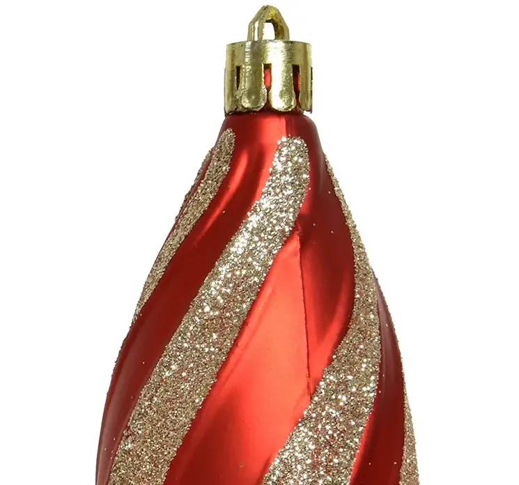 Juletræspynt formet som en dråbe i rød med guld glimmer af plast closeup