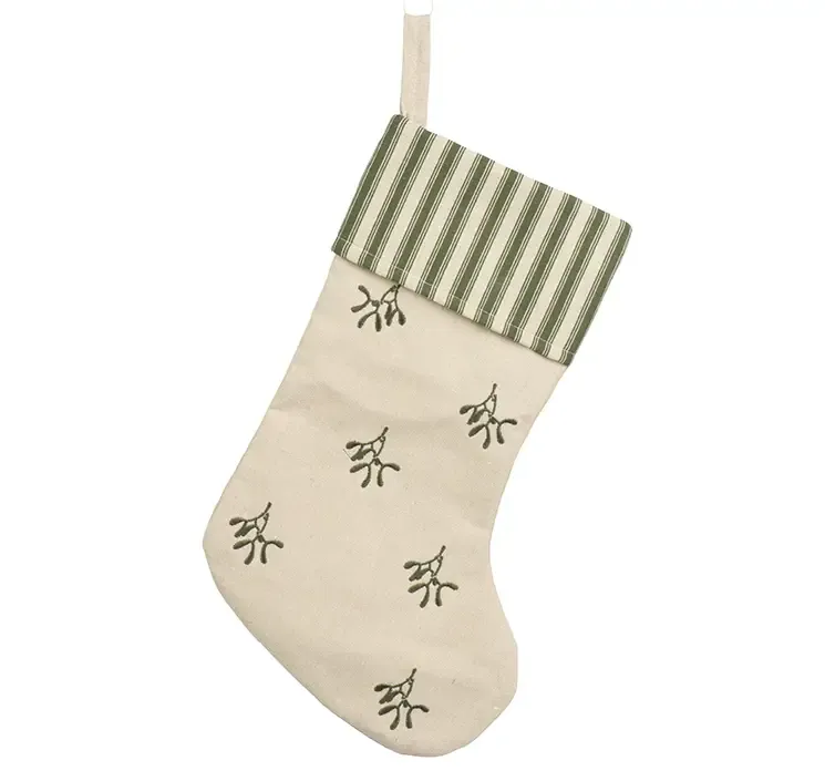 Julesok med grønne mistelten motiver og striber af stof i hvid