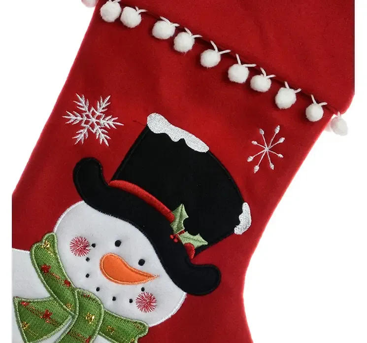 Julesok i rød af filt med snemandsmotiv closeup