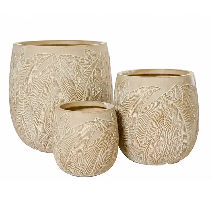 Krukkesæt af ler med bladmotiv af ler i naturfarvet