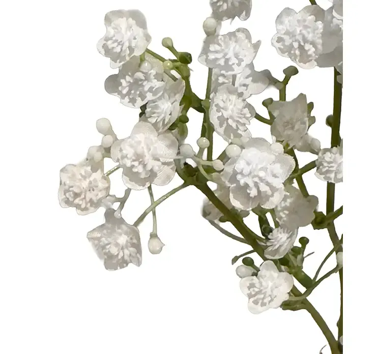 Kunstig brudeslør med hvide blomster af plast closeup