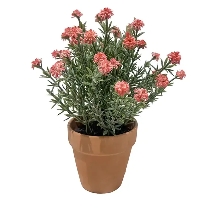 Kunstig brudeslør blomst i lyserød sat i potte