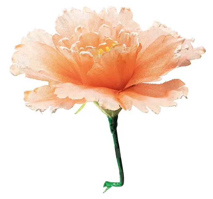 Kunstig blomst i fersken farvet af papir