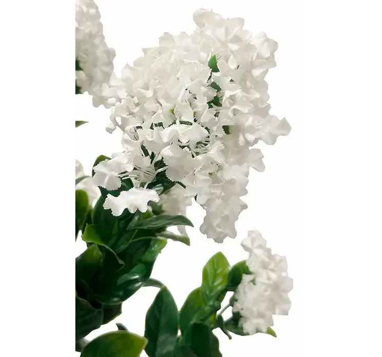 Kunstig syren blomst i hvid af plast i sort potte uv beskyttet closeup