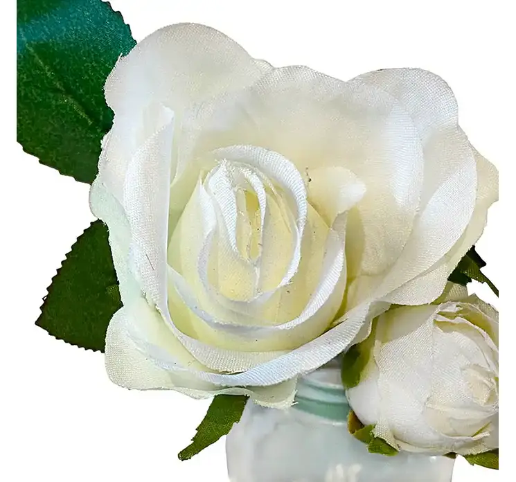Rose i glas kunstig blomst af kunstsilke i hvid closeup af rose