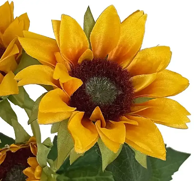 Solsikke kunstig blomst af plast i gul og orange med tre hoveder closeup