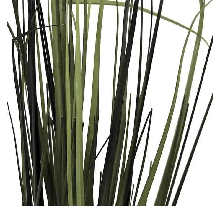 Kunstig græs bundt omkring styropor closeup af top