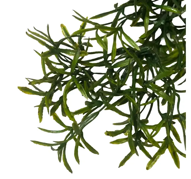 Kunstig græshænger i grøn af plast closeup