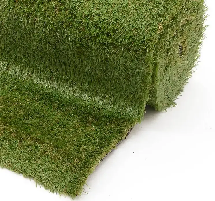 Kunstig græs måtte til både indendørs og udendørsbrug af plast i grøn. græsset er uv beskyttet closeup