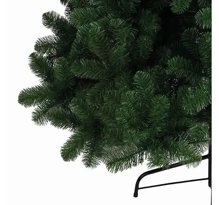 Kunstig gran juletræ imperial af plast i grøn closeup