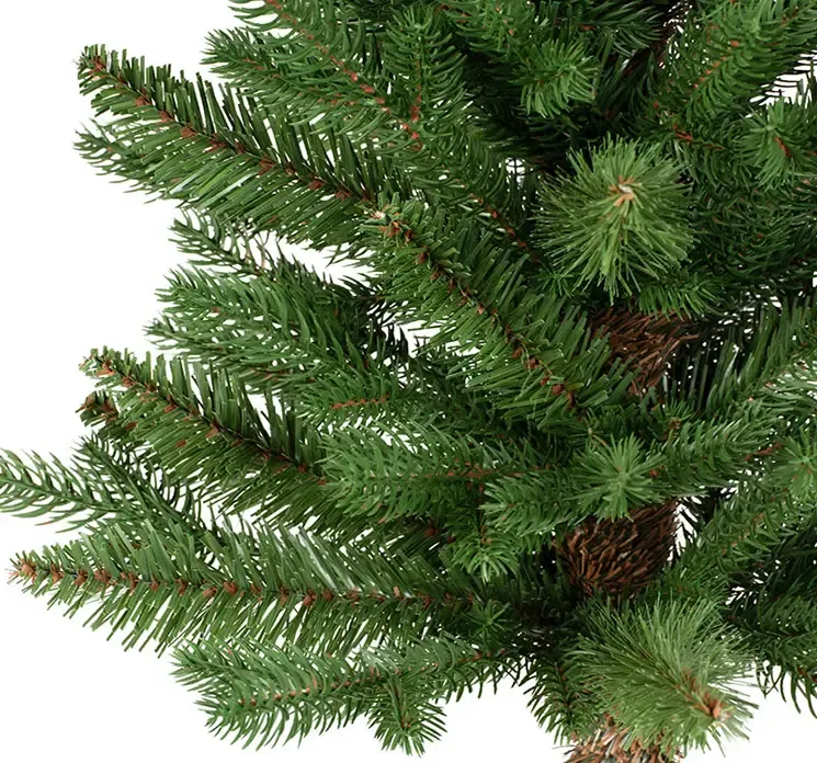 Kunstig gran juletræ greenhill af plast i grøn closeup