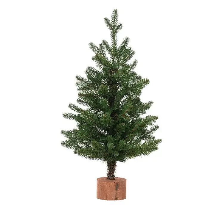 Kunstig gran juletræ greenhill af genbrugsplast i grøn sat på en træklods
