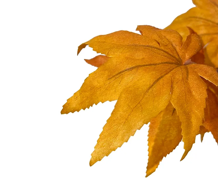 kunstig ahorn gren i orange closeup