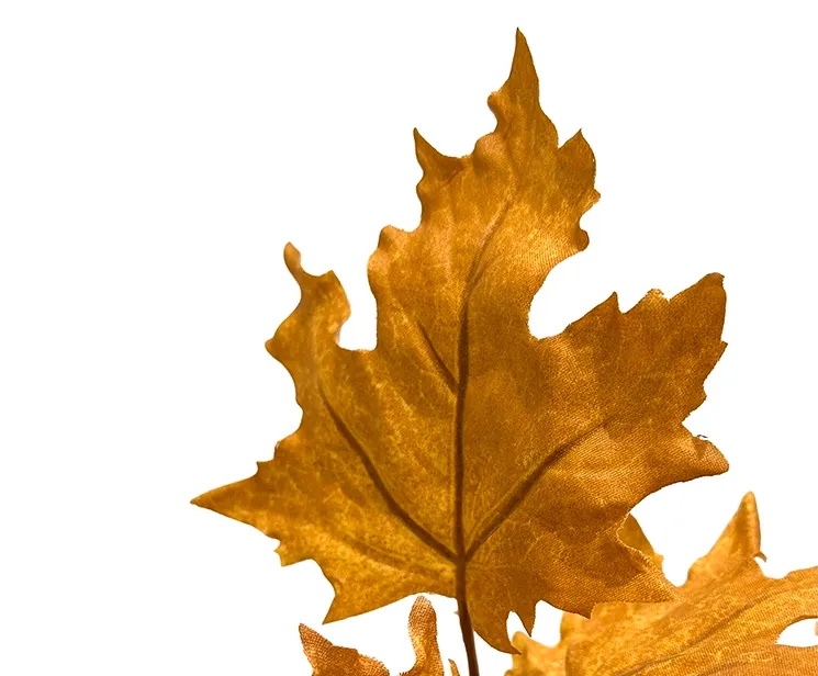 kunstig ahorn gren i orange closeup