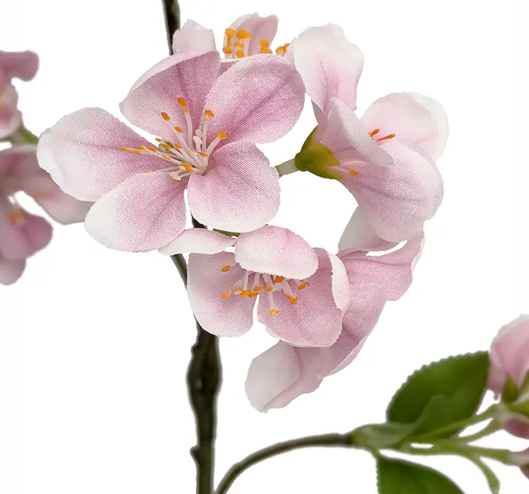 Kirsebærgren af plast med små lyserøde blomster kunstig gren closeup