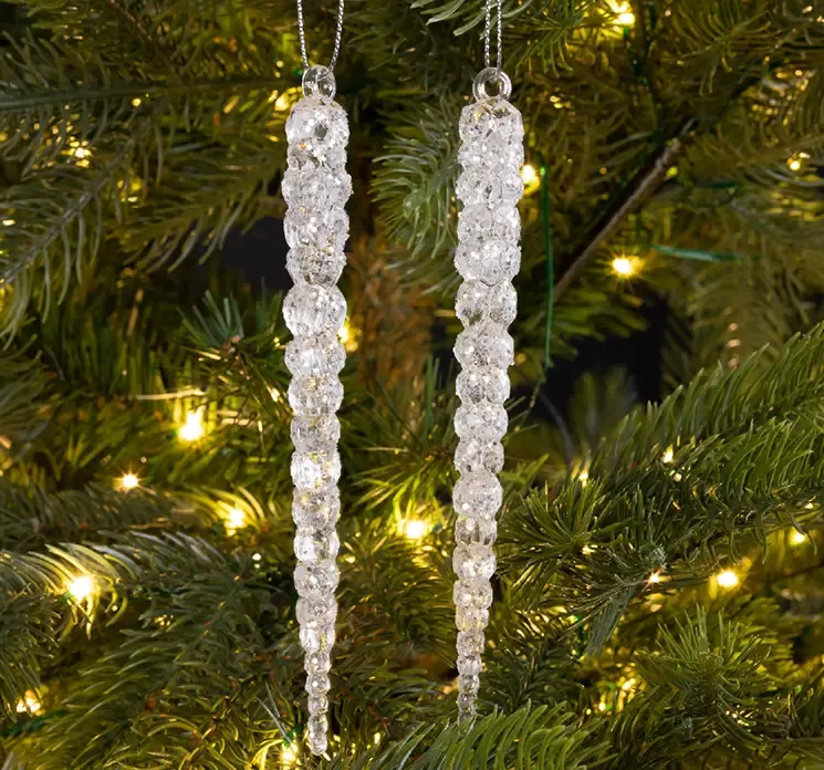 kunstig istap klar med glimmer af plast vist på juletræ