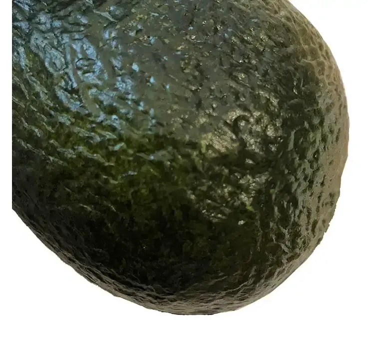 Kunstig avocado af plast closeup