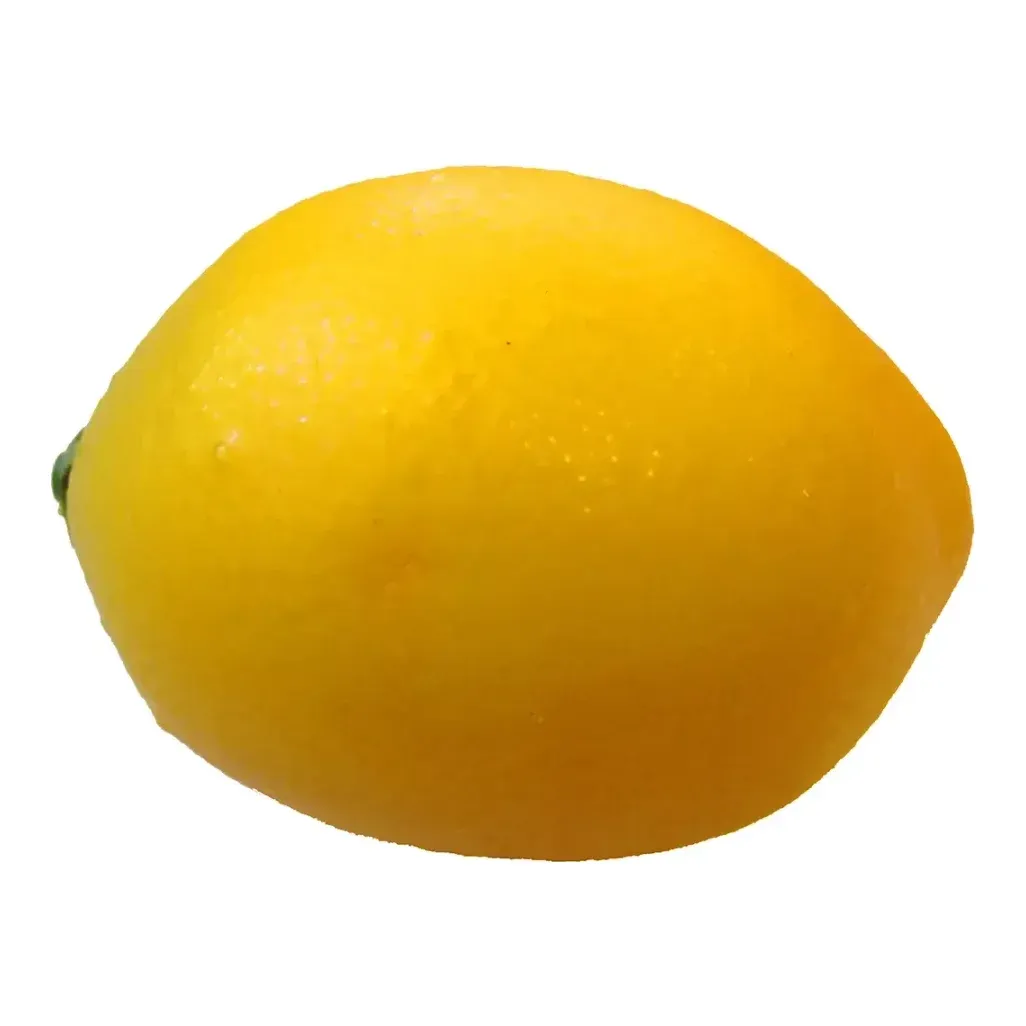 Citron kunstig af plast i gul madattrap