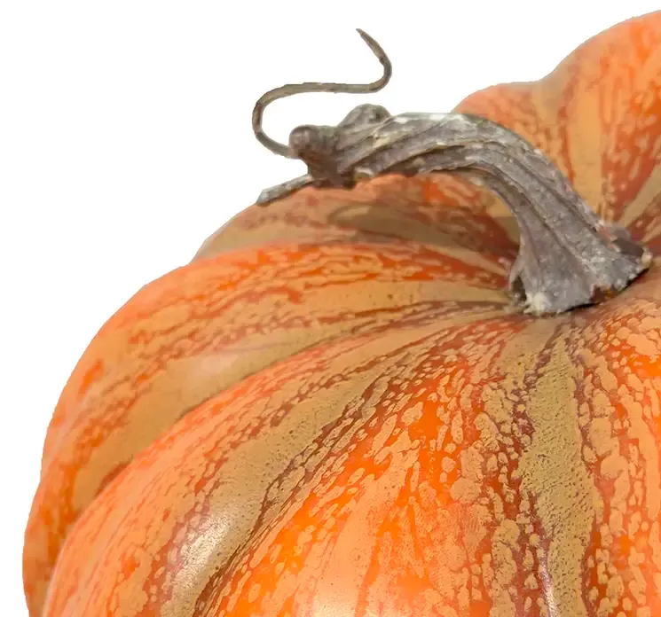 Græskar af plast i orange kunstig mad closeup