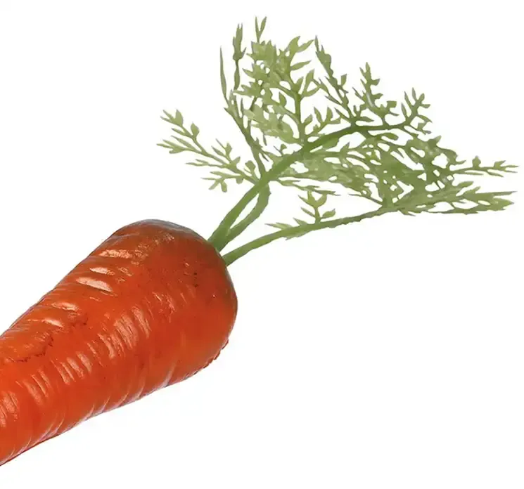 Kunstig gulerød med top af plast i orange closeup