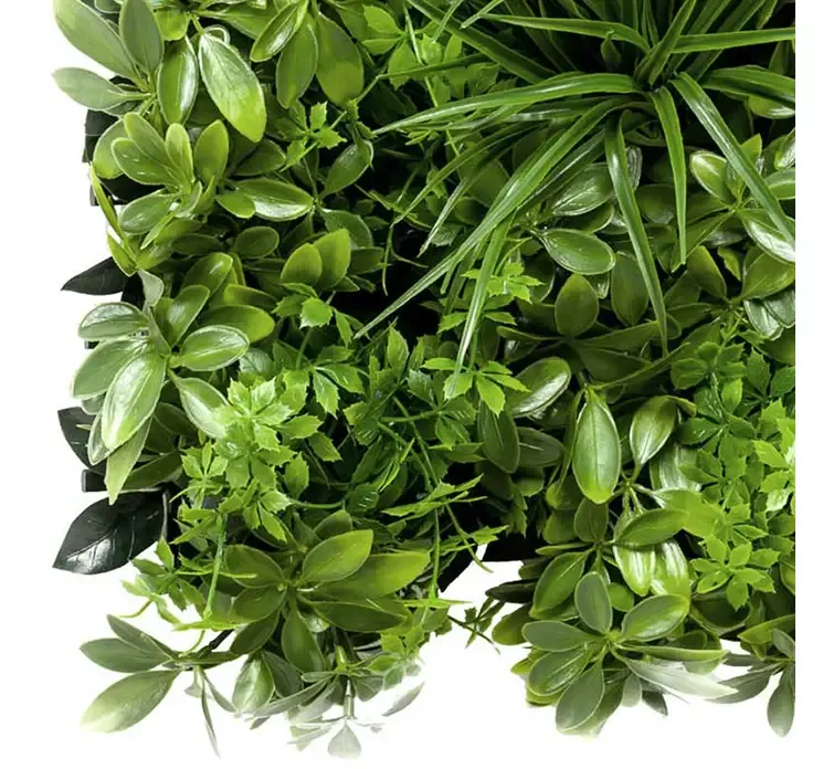 Kunstig bladmix plade med paraplytræ af plast uv beskyttet closeup