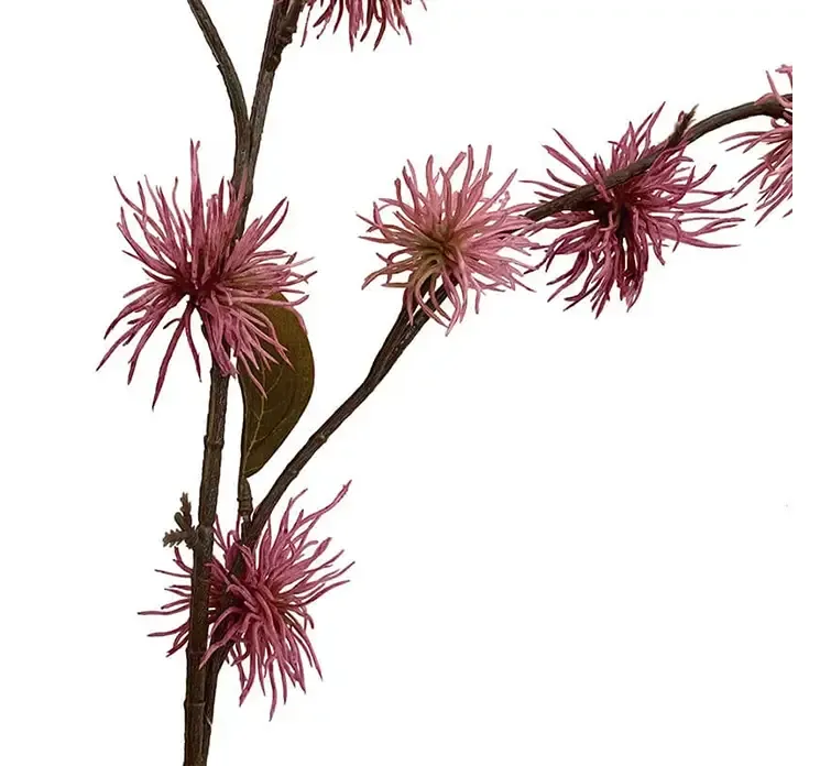 Brodfrø på stilk med lyserøde blomster af plast kunstig plante closeup