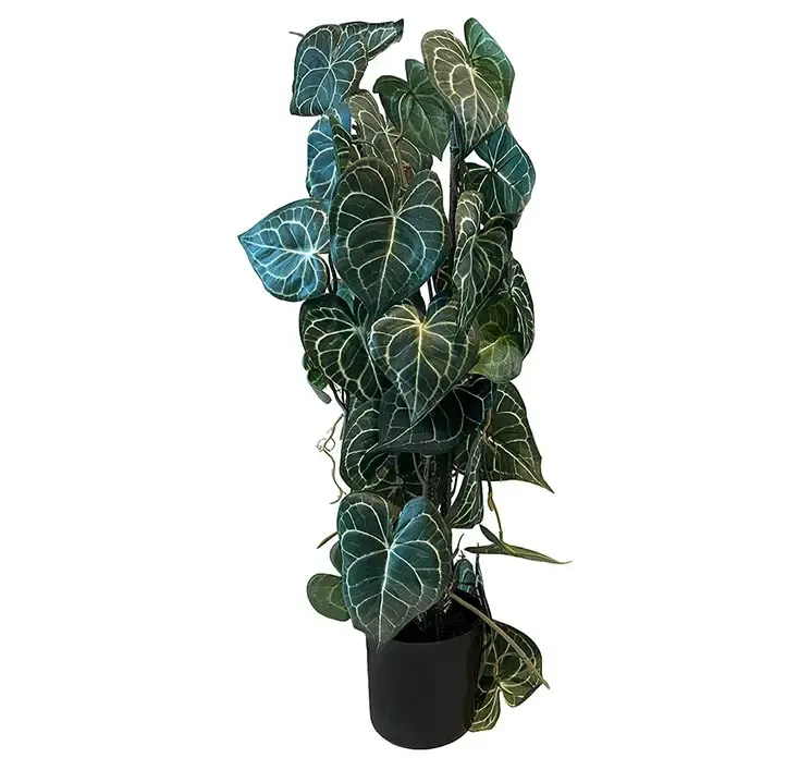 Kunstig krystal blad plante opbundet af plast i sort potte