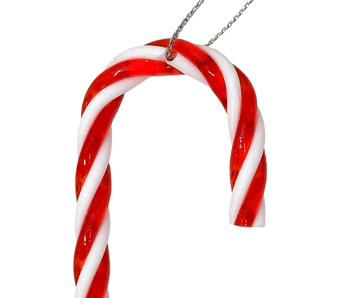 Kunstige slikstokke af plast i rød og hvid closeup