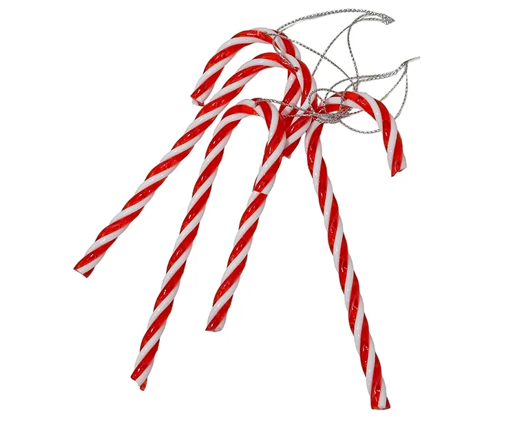 Kunstige slikstokke af plast i rød og hvid