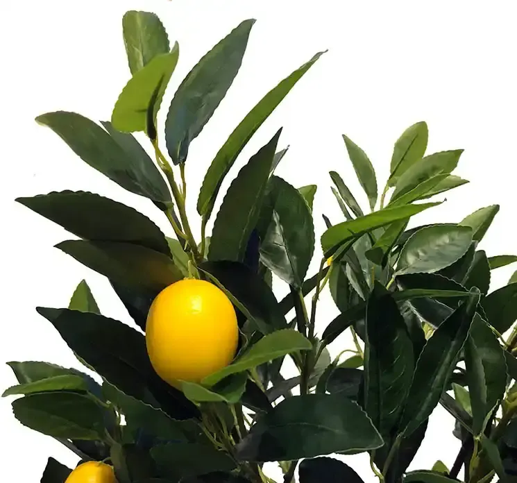 Kunstig citron træ i sort potte closeup af citroner og blade