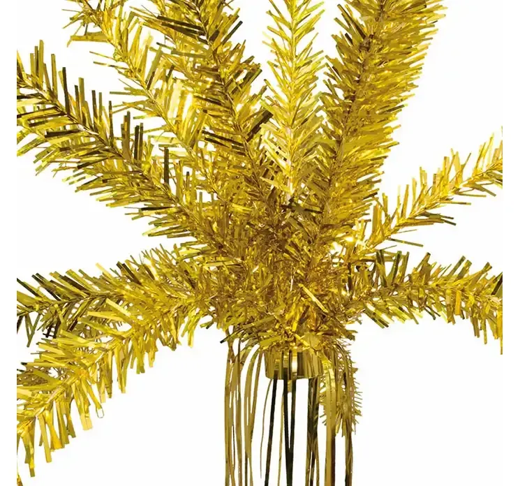 Palmefontæne i guld folie til nytårs dekoration closeup