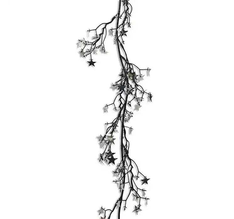 Stjerne ranke med små stjerner i sølv farvet closeup