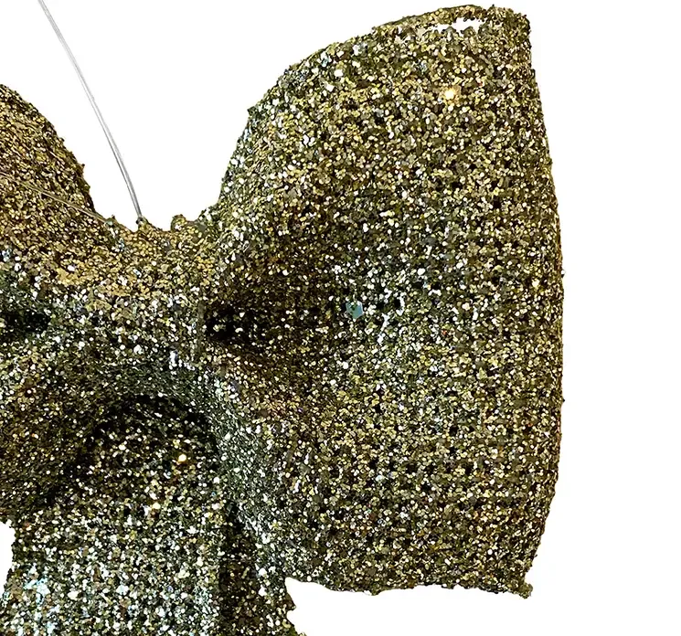 Sløjfe til ophæng i guld closeup