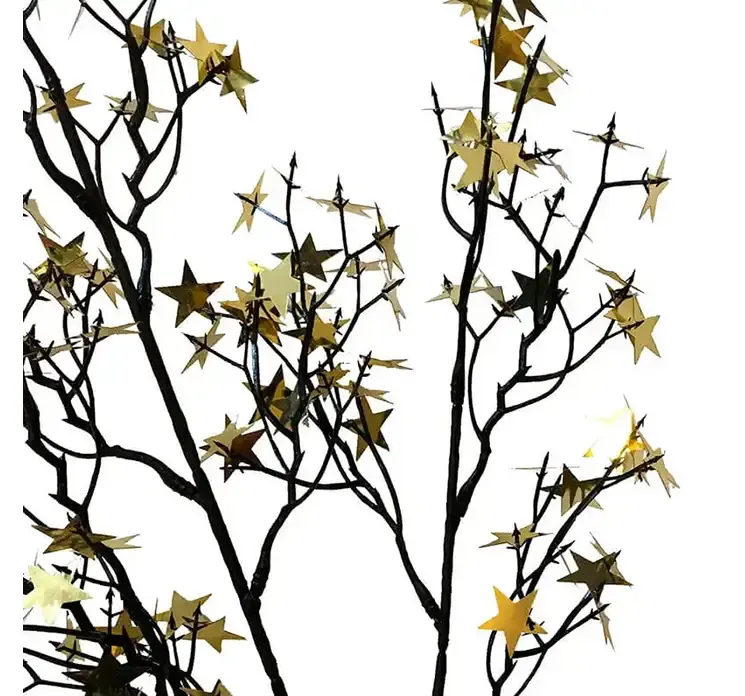 stjerne kvist gren i guld farvet af plast kunstig gren closeup