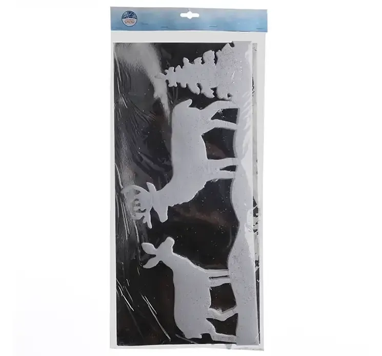 Vinduesbort med vintermotiv i hvid af træer og hjorte i pakningen